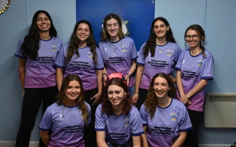 Diverse young Jewish athletes celebrating together